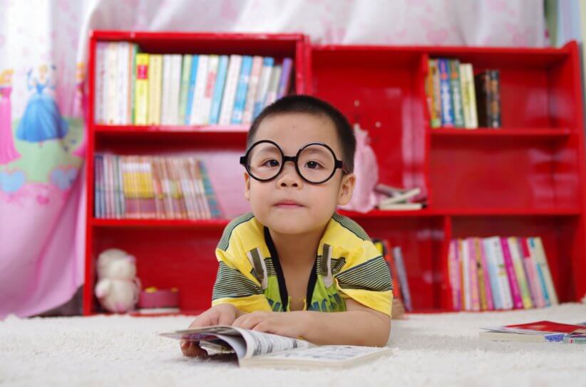 kid reading a book