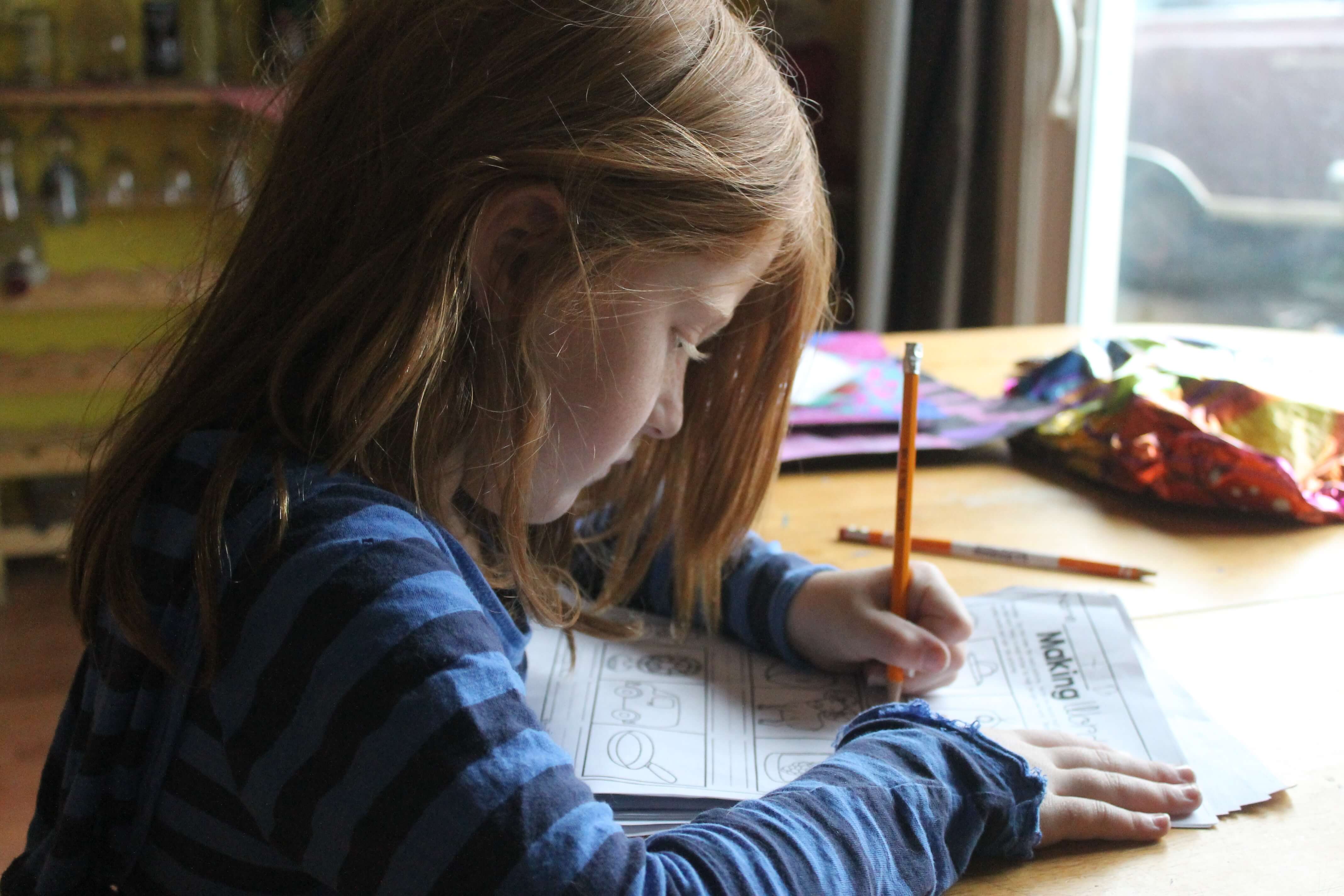 girl-doing-homework-executive-functioning-skills.jpg