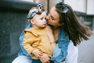 woman-holding-her-baby-girl-3671154