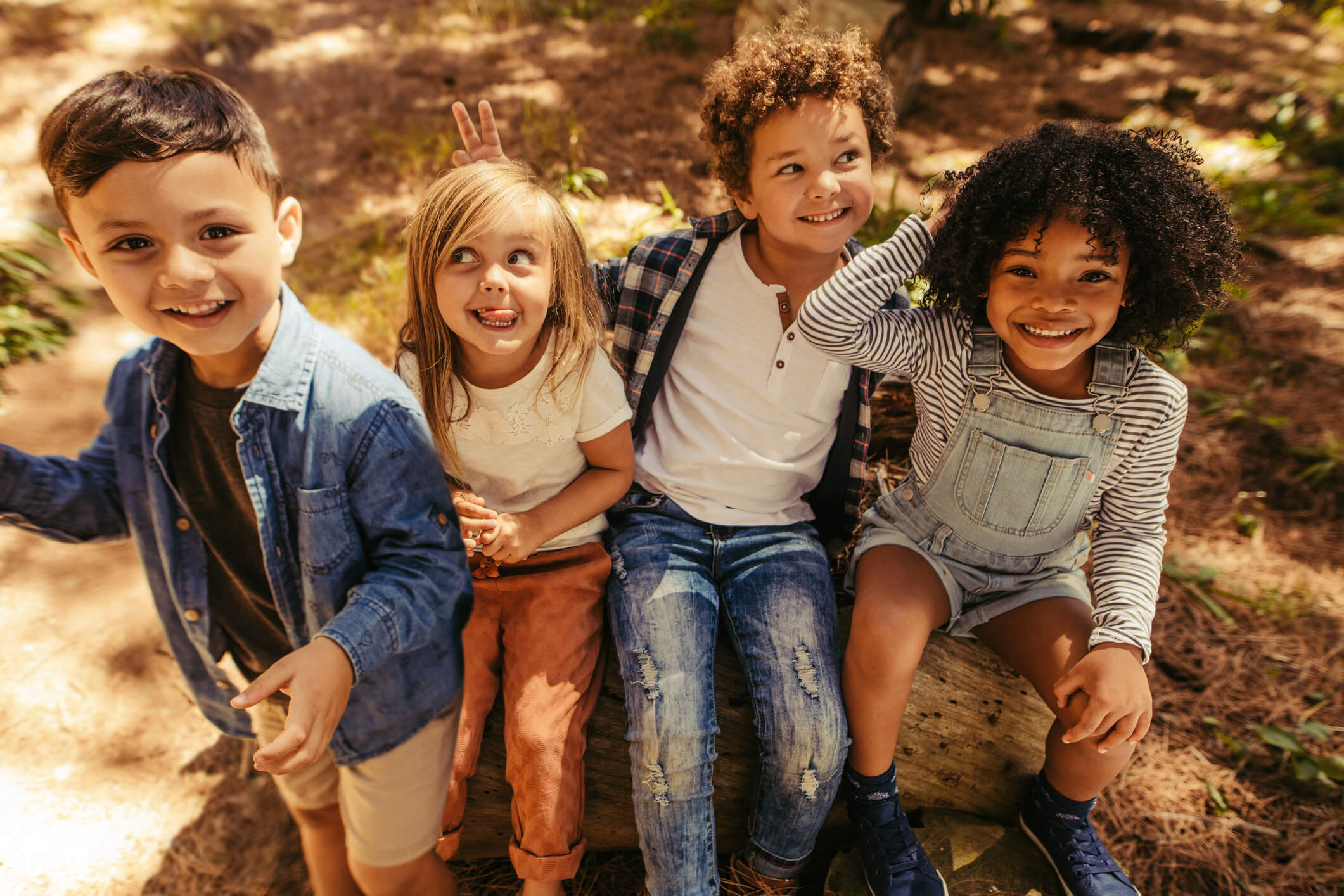 Children having fun in forest