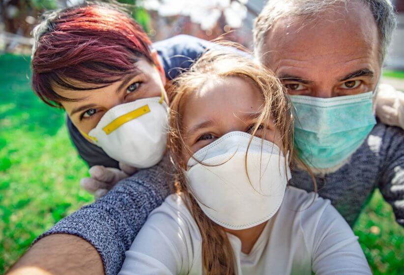 family with masks on 