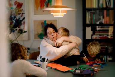 mom hugging child