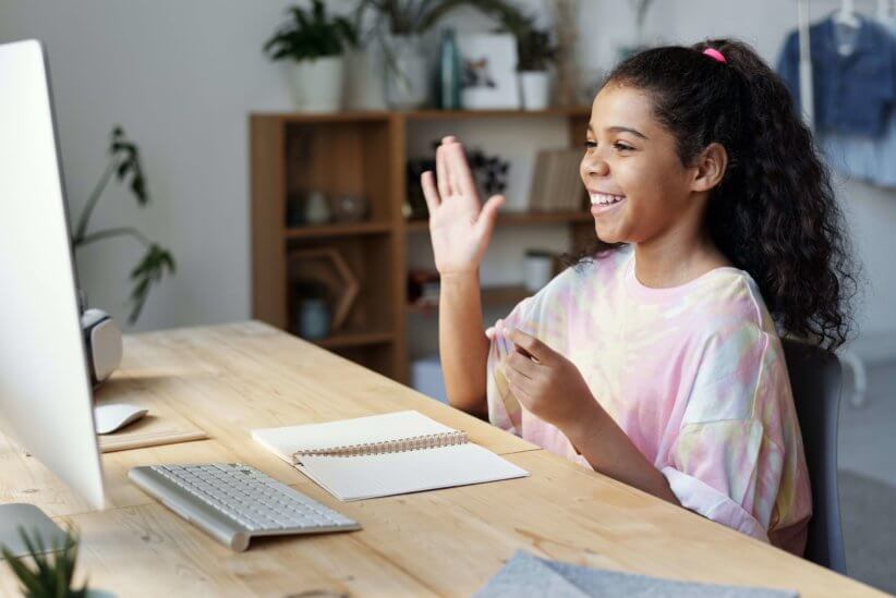 Kids participating in online theatre class.