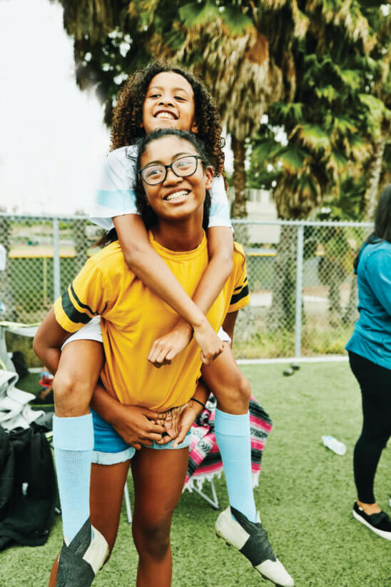 girls enjoying sports camp