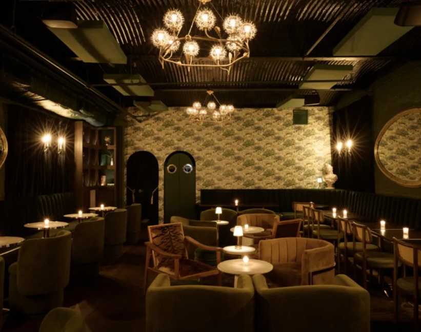 Dark dining hall at Dandelion cocktail bar in the village