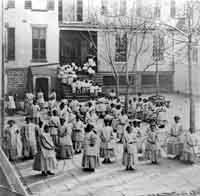 2.11.3.a_ColoNEWedOrphAsylumExteriorGirlsWithHoops