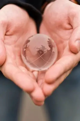 hands holding a globe