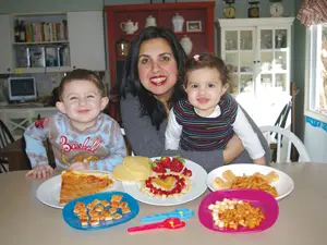 Anila Nitekman, inventor of the Tiny Bites Food Shears, with children