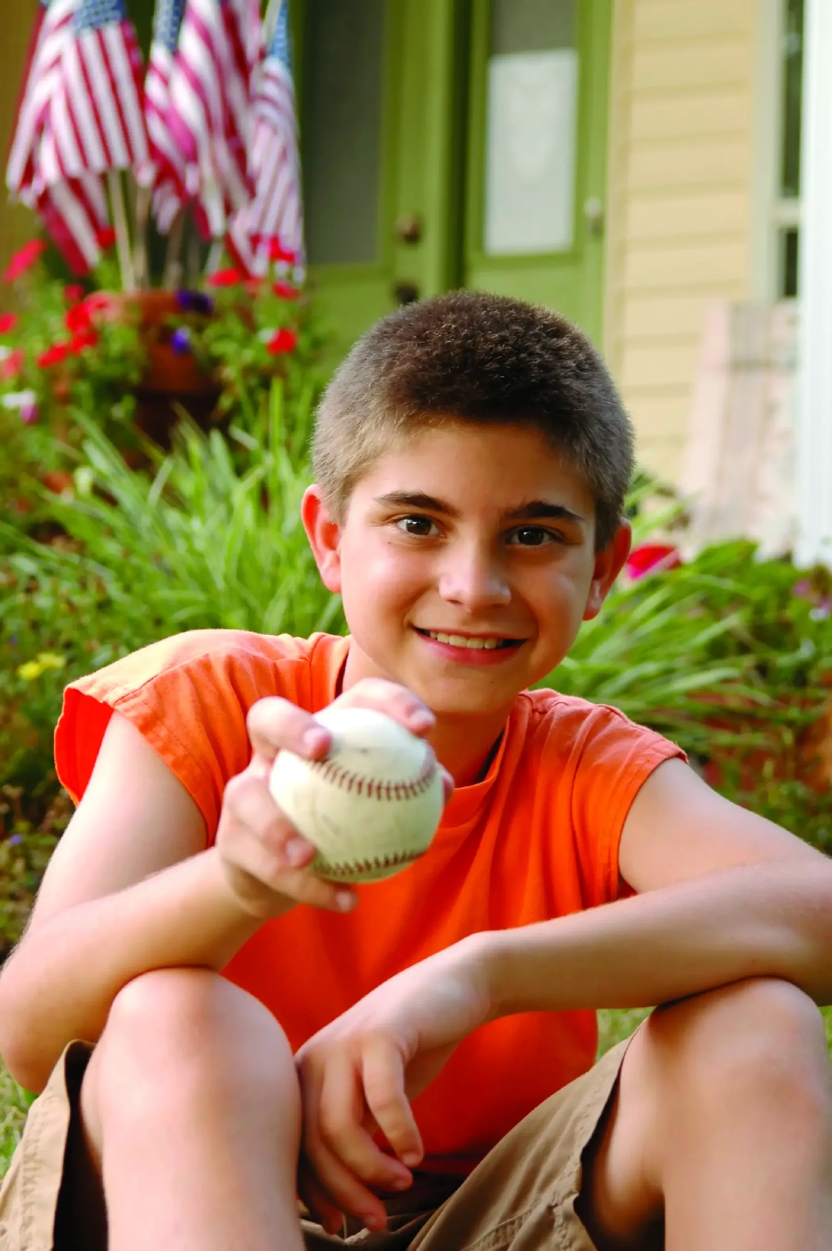 Boy holding baseball