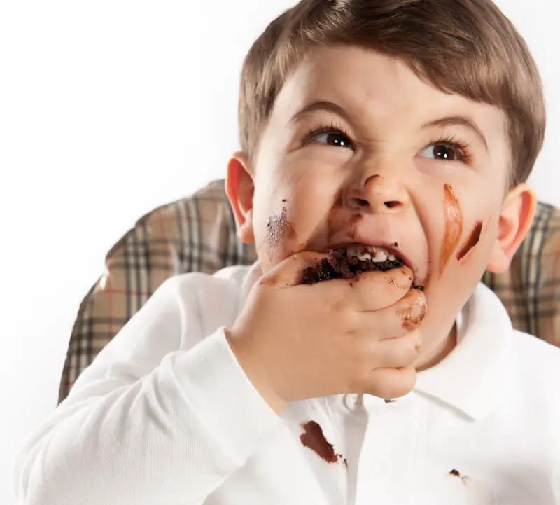 boy eating chocolate