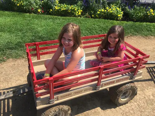 Riding a tractor at Cherry Crest Farm