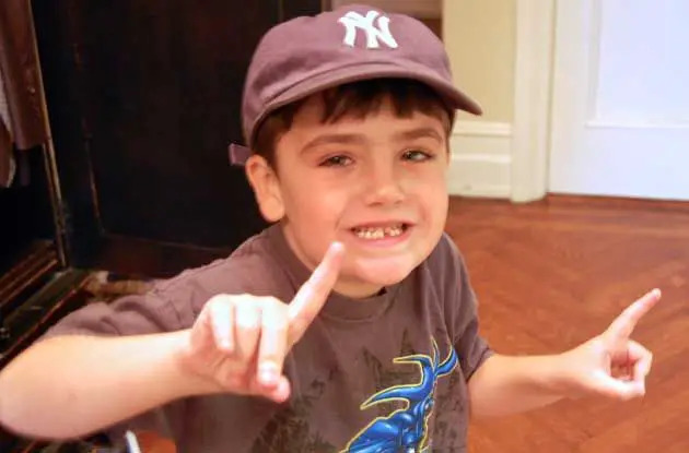 little boy in yankee hat