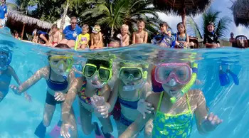 Kids snorkeling in Curacao, Caribbean