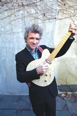 Dan Zanes playing the guitar; Dan Zanes concert in Brooklyn