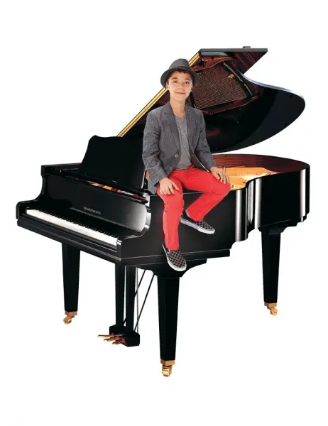 Ethan Bortnick On A Piano
