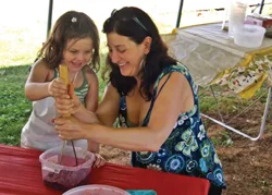 Fun on the Farm Day with Lil Chefs; little girl and mom make blueberry jam