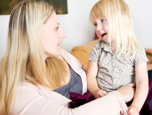 gentle discipline; blonde mother and daughter