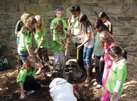 Earth Day; kids celebrating earth day; kids planting a tree; Greenburgh Nature Center