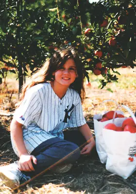 Laura Kish, apple picking in New York Yankees jersey