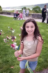 Wave Hill; young girl holding flowers; Mother's Day activities, Bronx