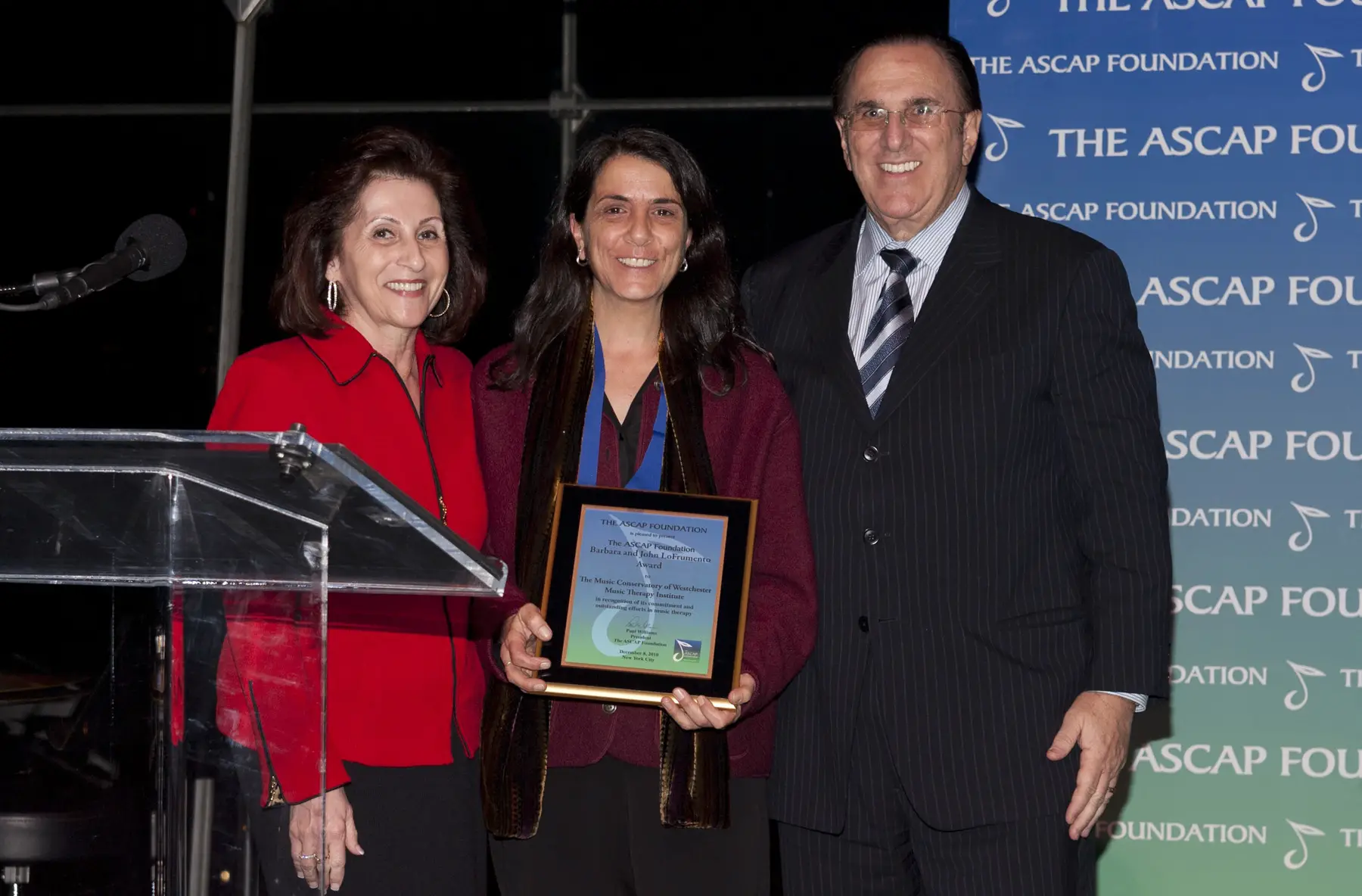 ASCAP CEO John LoFrumento (r) and his wife Barbara (l) present The ASCAP Foundation Barbara and John LoFrumento Award to Lisa Sandagata, Director of Outreach Services for the Music Conservatory of Westchester’s Music Therapy Institute.