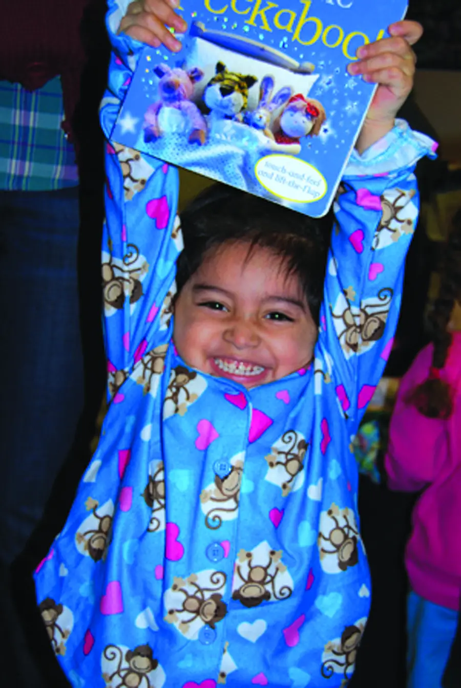 The nonprofit Pajama Program provides needy kids with new PJs and books—items that help bring comfort to a tough situation; Courtesy Pajama Program 