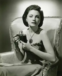 retro woman with perfume bottle 