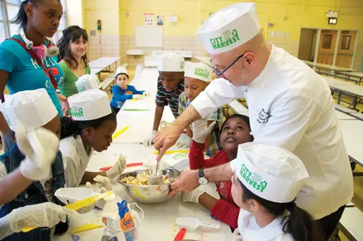 Chef Ron Ben-Israel teaches Brooklyn students to make healthy desserts