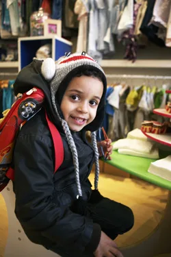 Carlo Finzi-Dubois, 4½, models high-quality, affordable clothing from Stork.