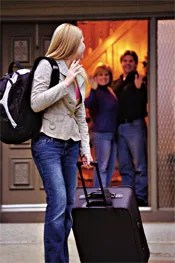 teen leaving home with suitcase