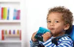 toddler drinking juice