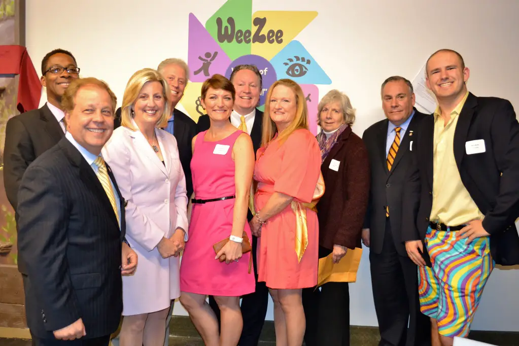 Joseph Kenner, Assistant to the County Executive at Westchester County (in back); New York State Assemblyman Thomas Abinanti; Shannon White (event Emcee) of News 12; WeeZee Executive Director of Project Development Liz Crecco; Westchester County Legislator Michael Smith; WeeZee Founder and CEO Louise Weadock; New Castle Town Supervisor Susan Carpenter; New York State Assemblyman Robert Castelli and WeeZee Manager of Research and Development Paul Rowe