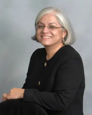 Dr. Yvette Caro, director of the Queens College Psychological Center