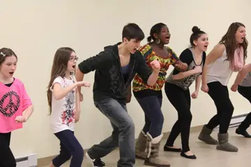 students rehearsing at performing arts school
