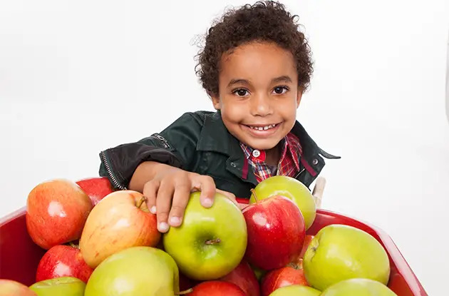 boy with apples