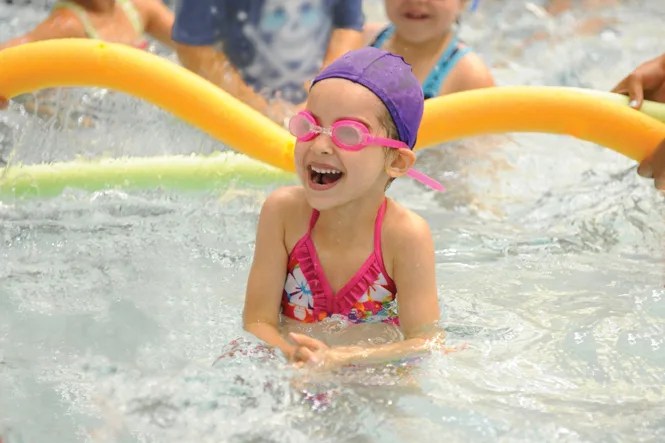 girl swimming in pool