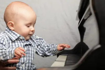 baby playing piano