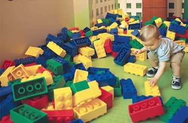 baby-playing-with-legos