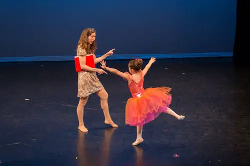 A teacher and student at The Ballet Club in Manhattan