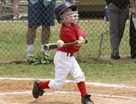 child playing baseball