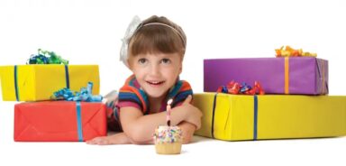 birthday-girl-with-cupcake-and-presents