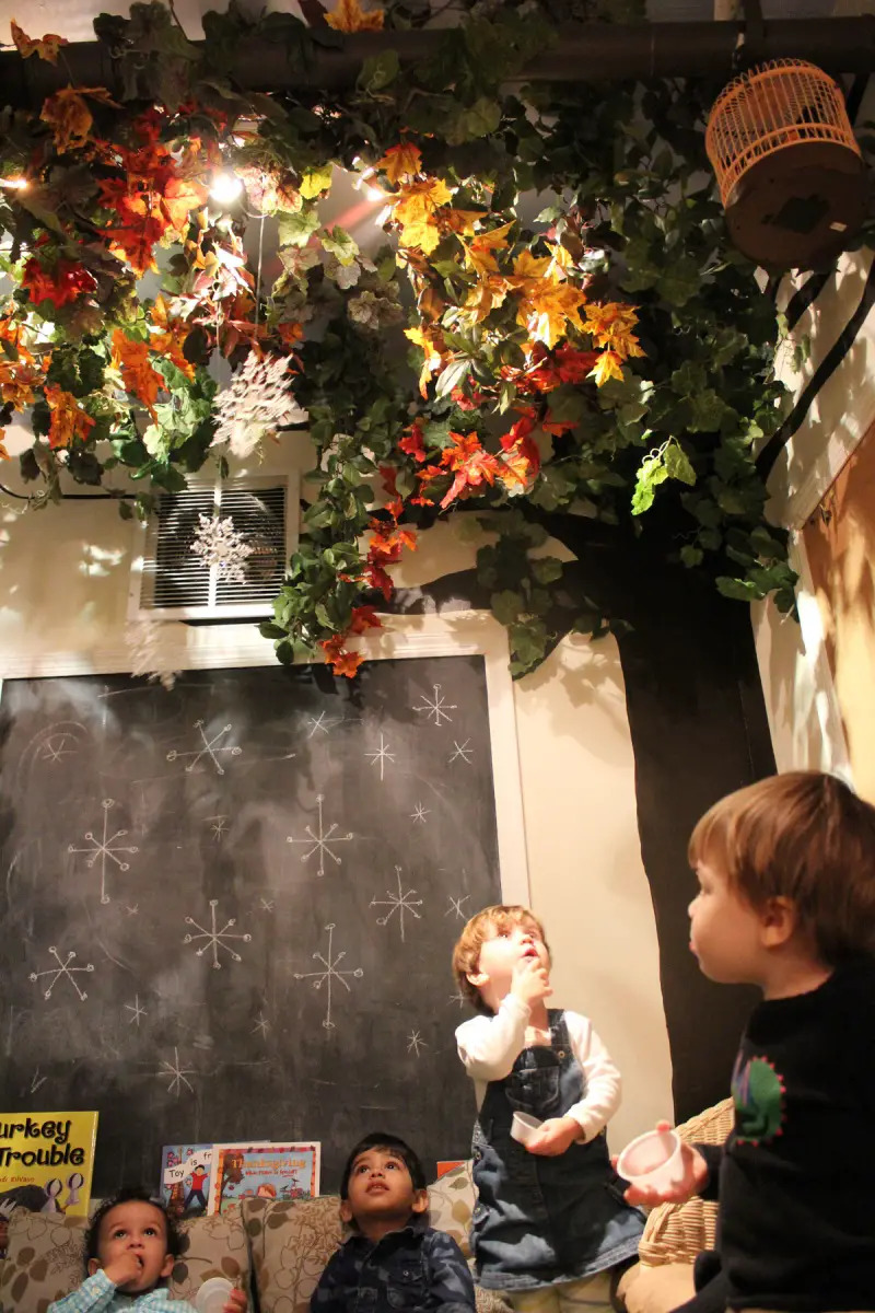 children looking at snowflakes