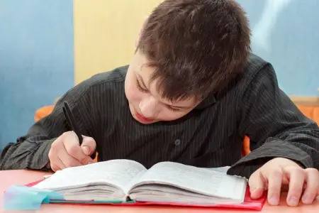 boy doing homework