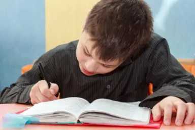 boy-at-desk-doing-homework