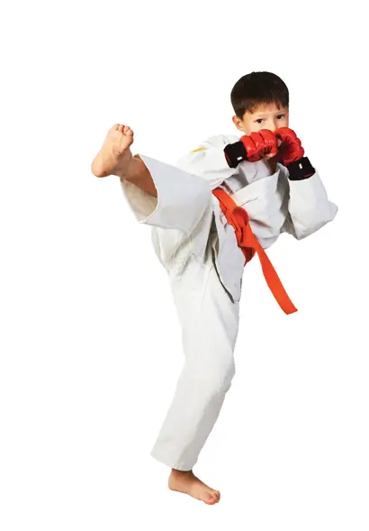 boy kickboxing wearing gloves