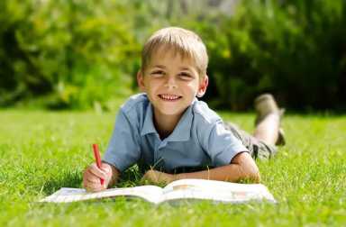 boy-lying-in-grass