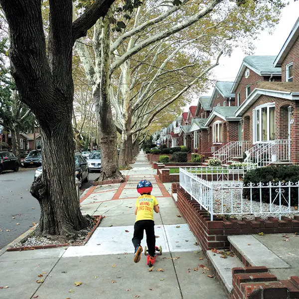 boy riding scooter