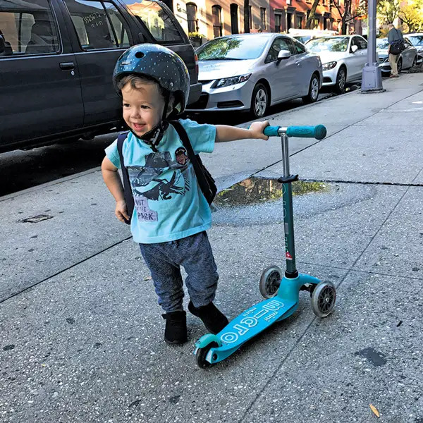 boy scooter smiling