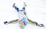 Boy Makes Snow Angel