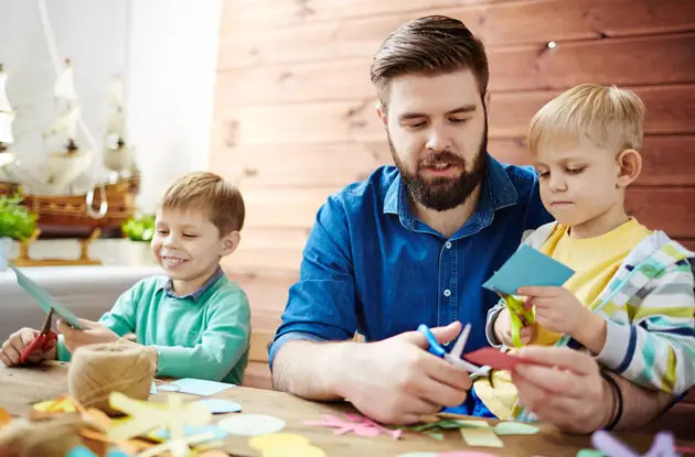 boys and father crafting